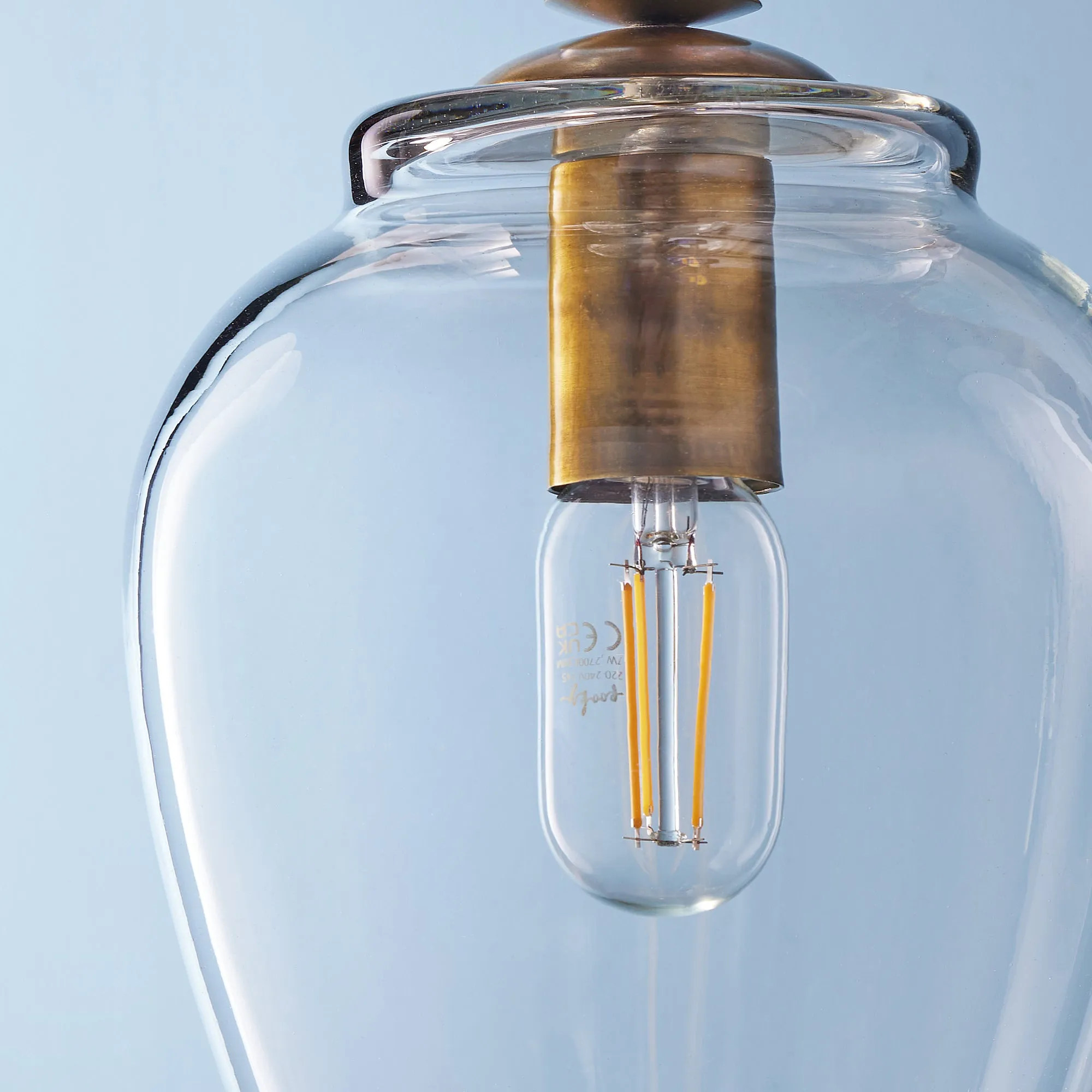Pecadillo pendant light in glass with brass