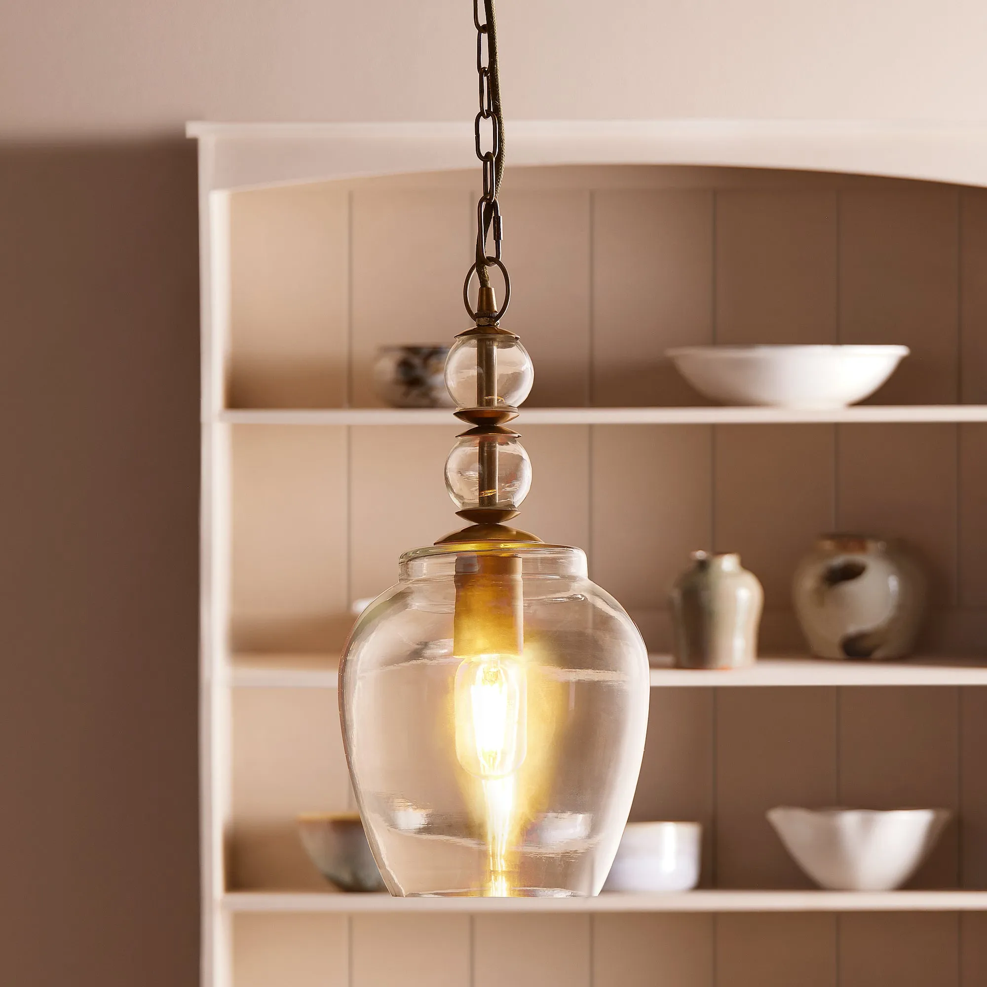 Pecadillo pendant light in glass with brass