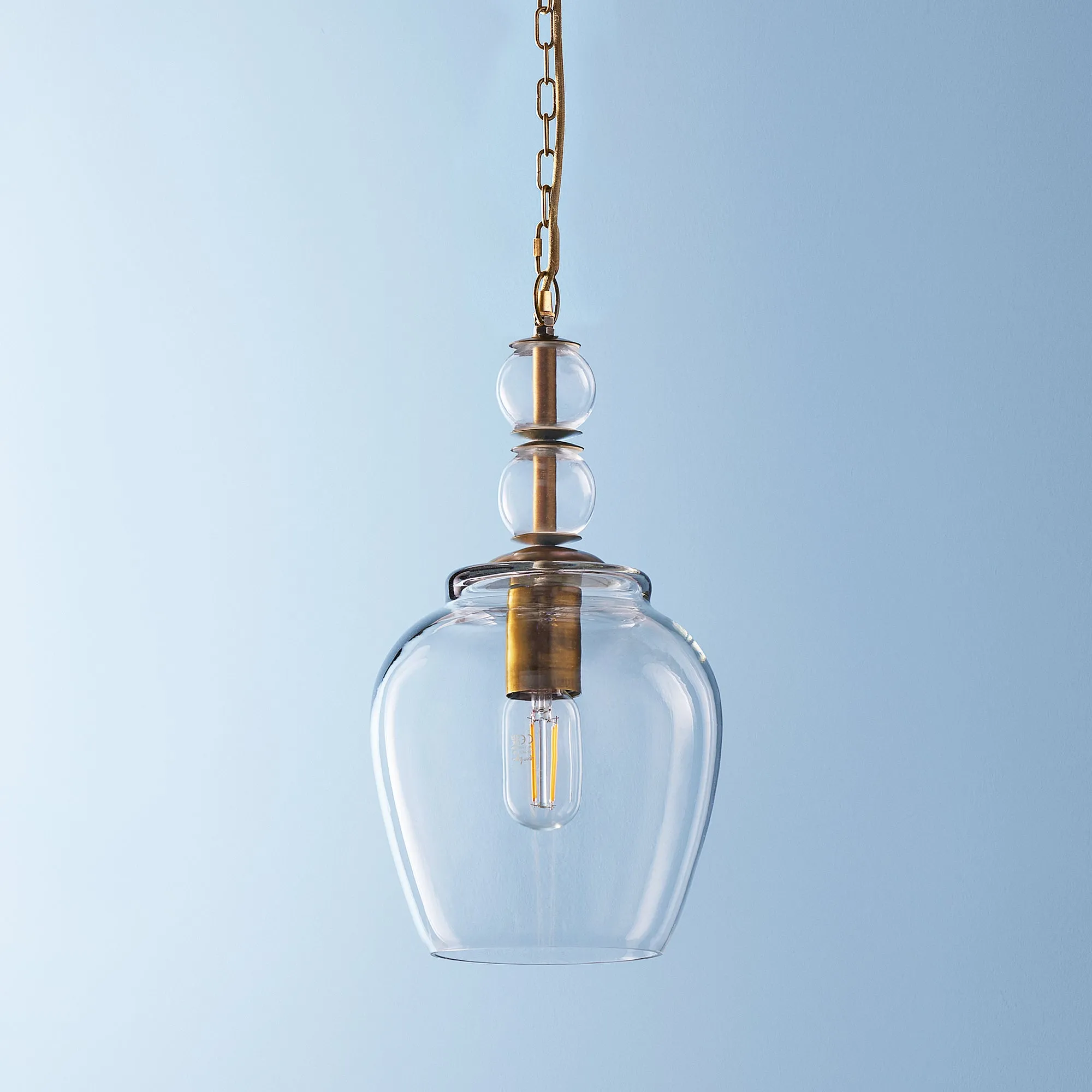 Pecadillo pendant light in glass with brass